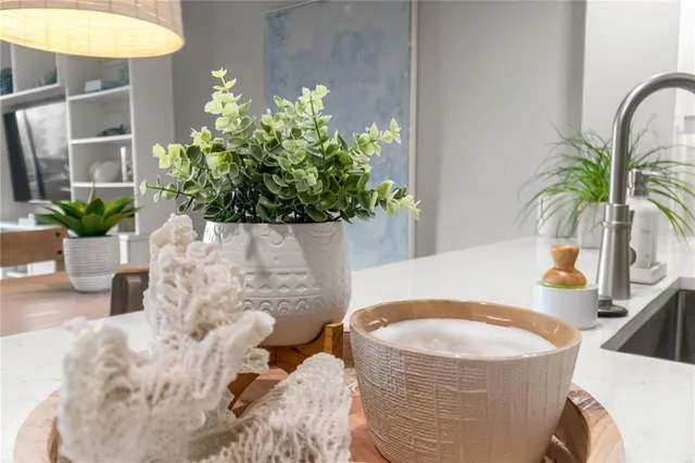 a bedroom with a bed and a night stand