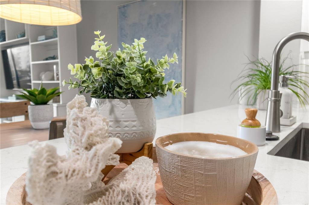 6035 Sea Ranch Drive, Unit 203 Hudson, FL 34667 - Photo 32 of 55 a vase of flowers sitting on a table