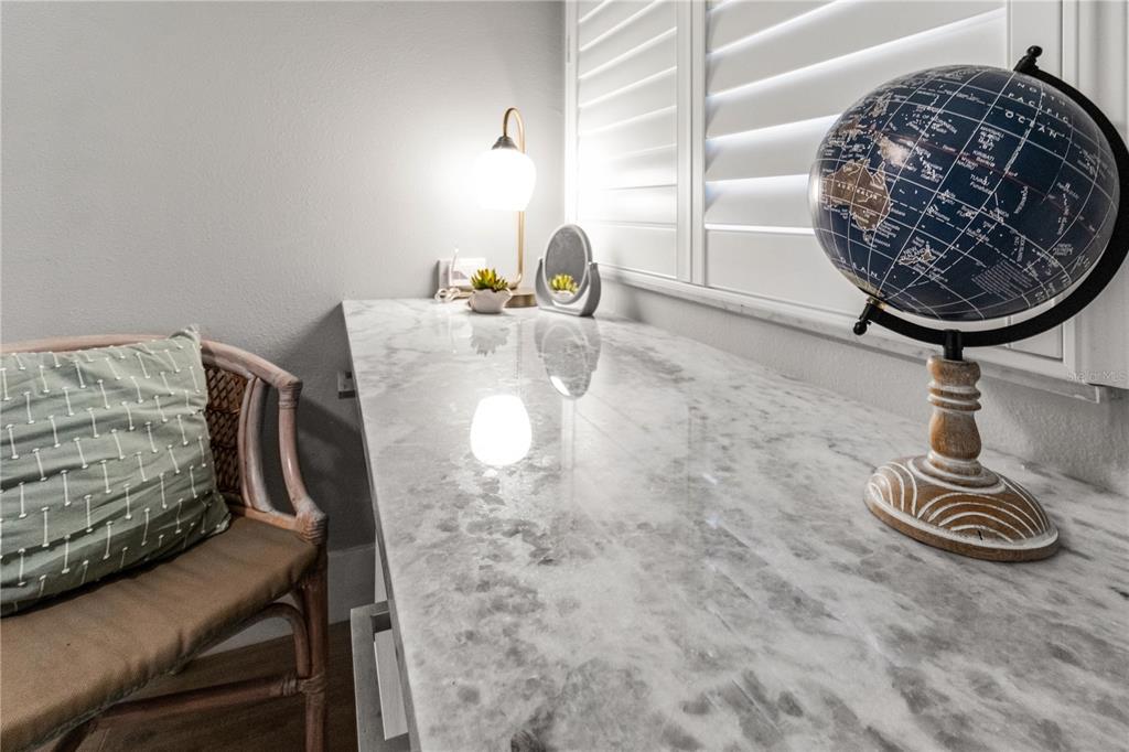 6035 Sea Ranch Drive, Unit 203 Hudson, FL 34667 - Photo 36 of 55 a table with a vase and window