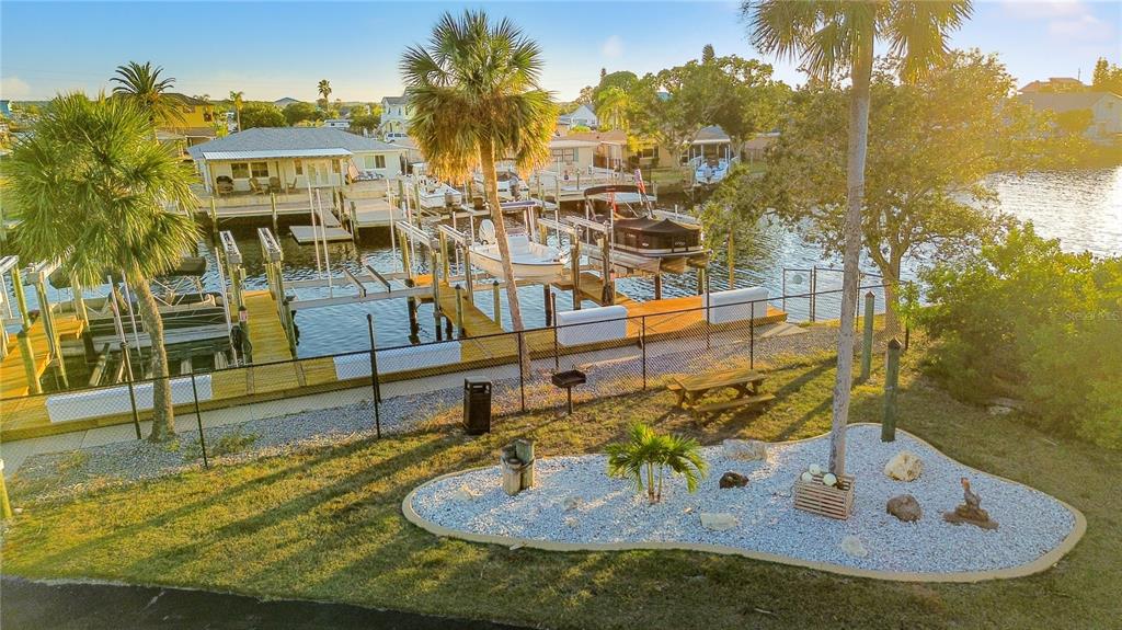 6035 Sea Ranch Drive, Unit 203 Hudson, FL 34667 - Photo 41 of 55 a view of a house with a swimming pool