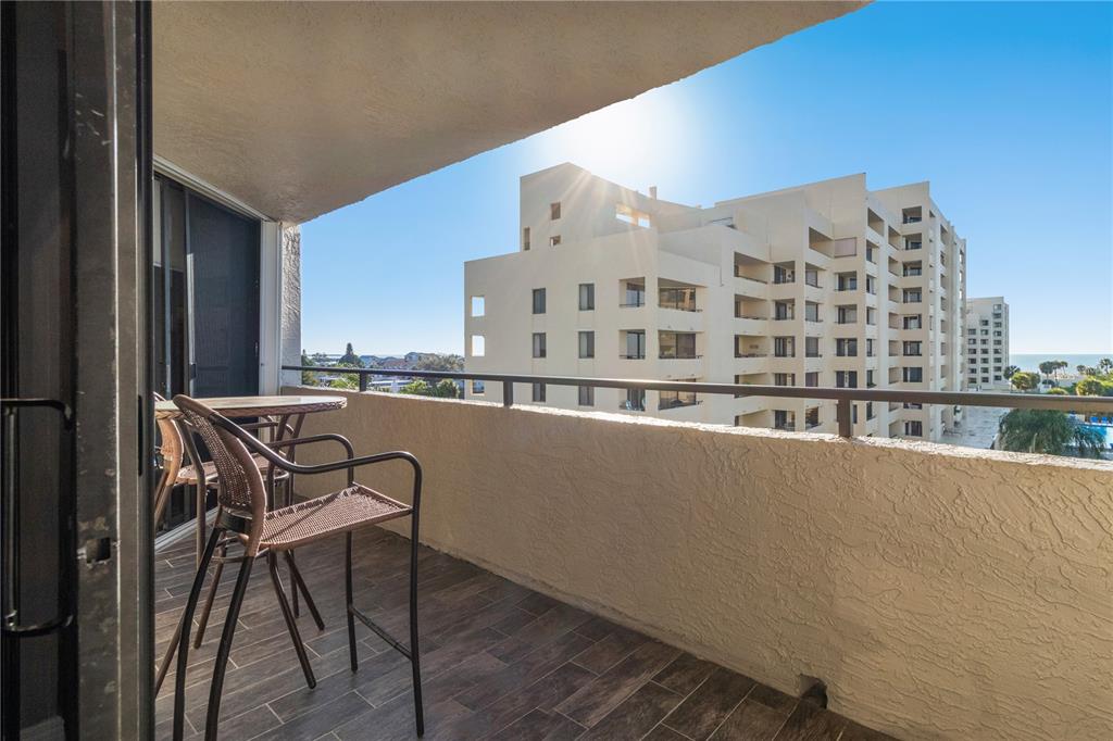 6035 Sea Ranch Drive, Unit 203 Hudson, FL 34667 - Photo 50 of 55 a view of a balcony with chairs