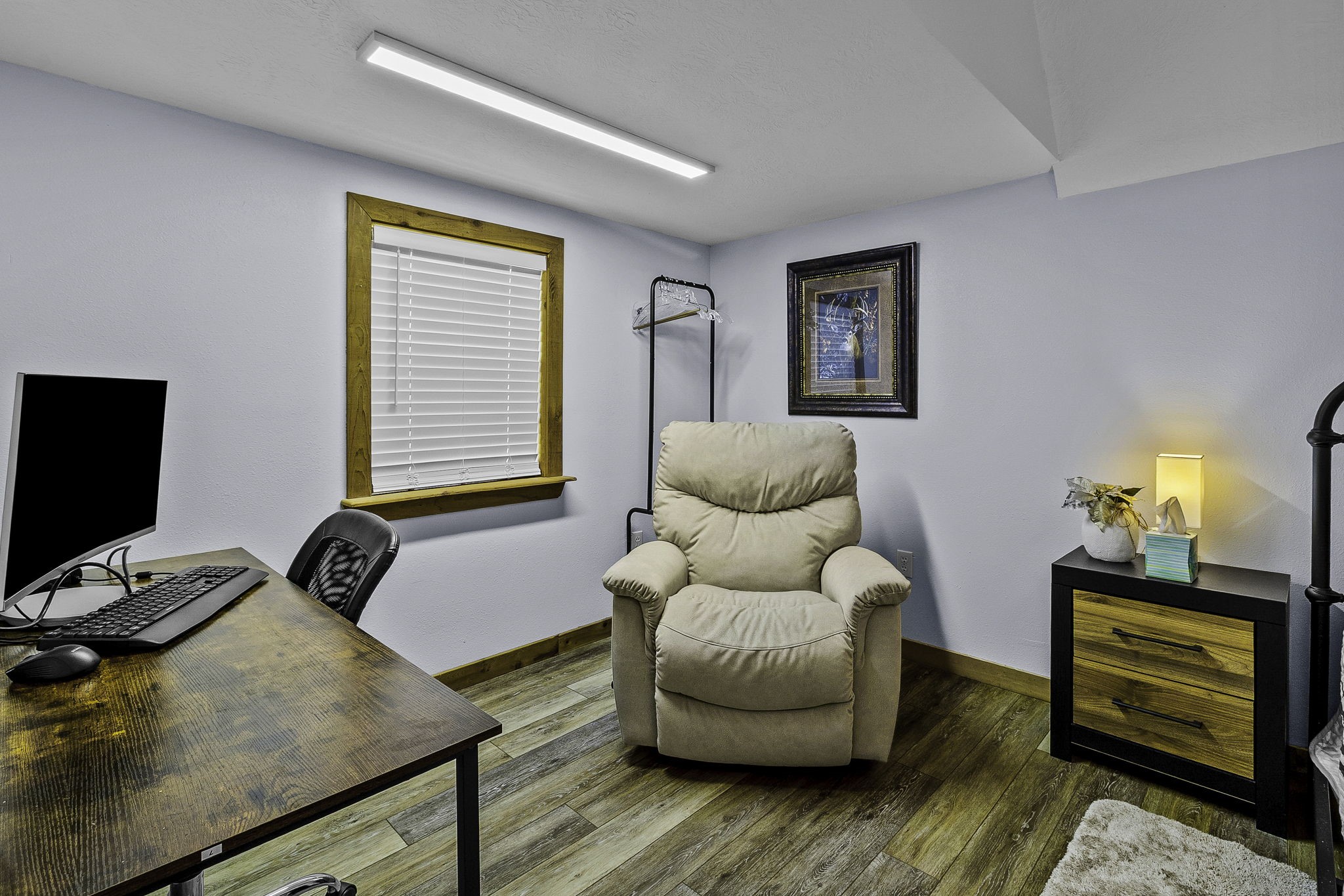 188 Huckleberry Road Onalaska, TX 77360 - Photo 29 of 49 a bedroom with furniture and a window