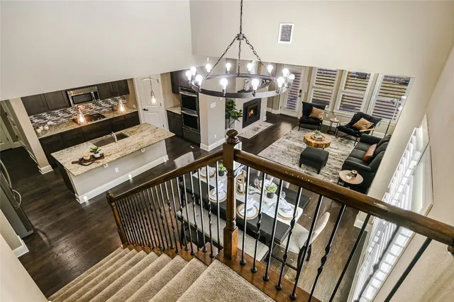 a dining room with wooden floor and breakfast area