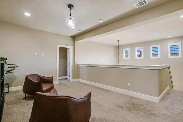 a view of a livingroom with furniture