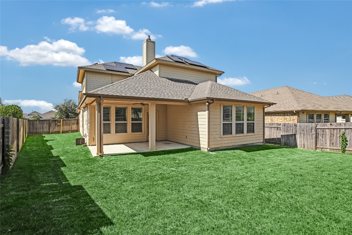 416 Cherokee Rose Circle Georgetown, TX 78626 - Photo 22 of 36 a view of a house with a yard and sitting area