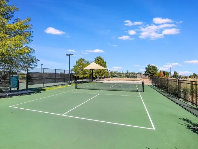 a view of a lake with a yard