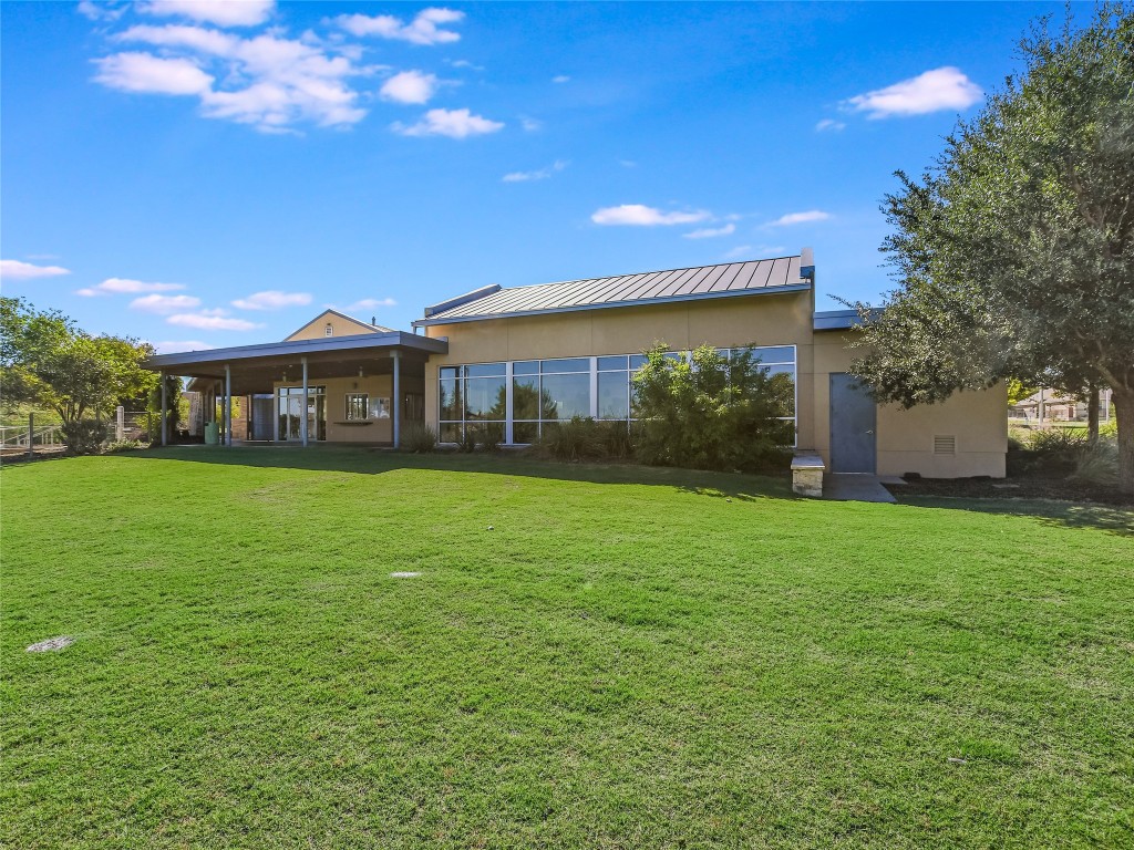 416 Cherokee Rose Circle Georgetown, TX 78626 - Photo 35 of 36 a front view of a house with garden