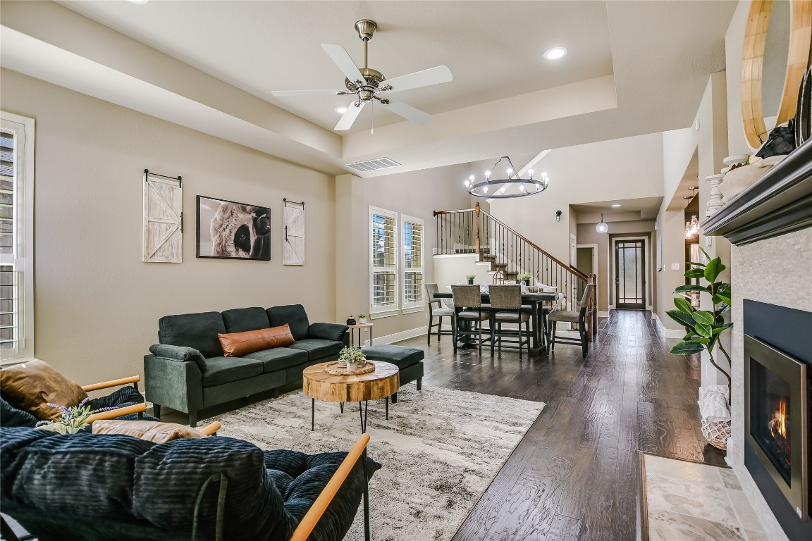 416 Cherokee Rose Circle Georgetown, TX 78626 - Photo 36 of 36 a living room with furniture and a fireplace