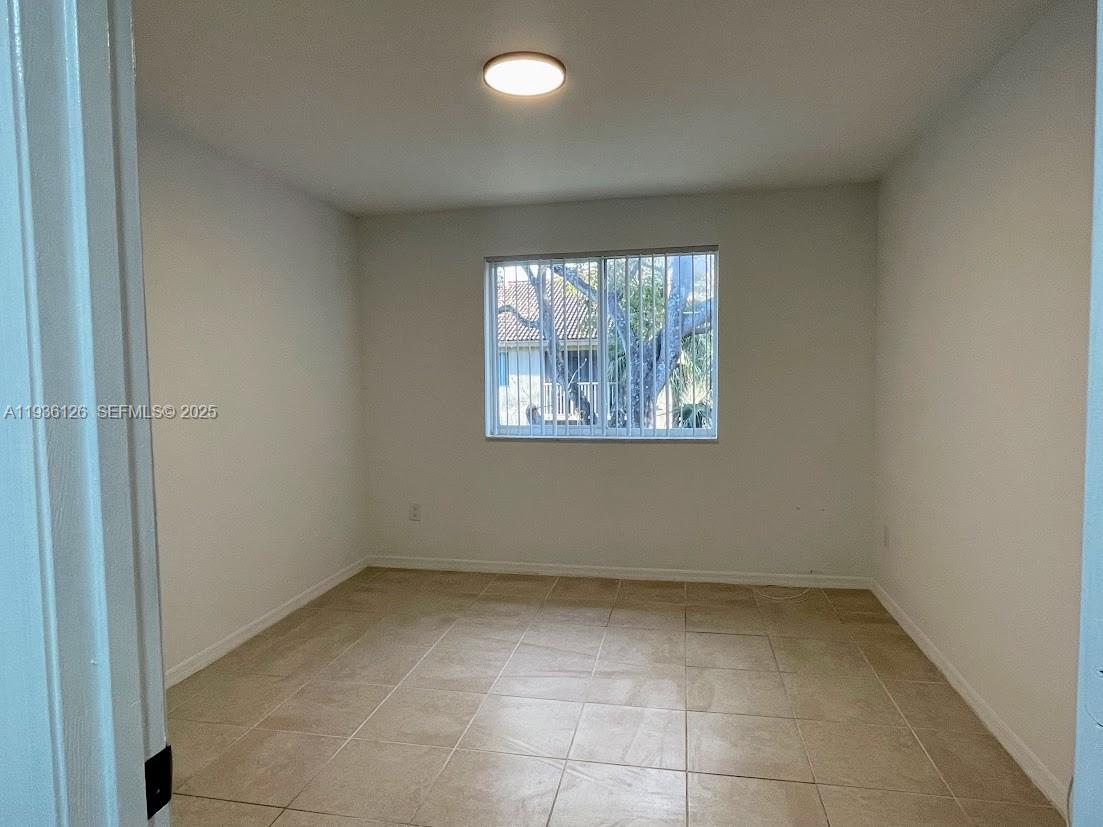 430 South Park Road, Unit 3305 Hollywood, FL 33021 - Photo 12 of 27 an empty room with windows