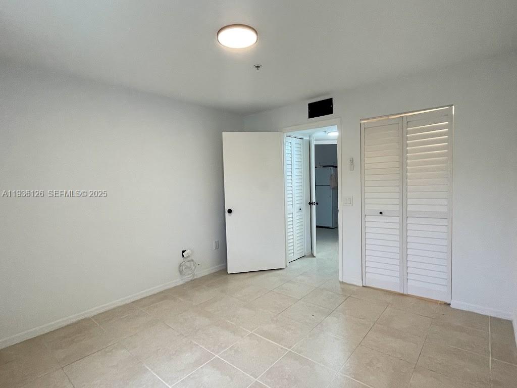 430 South Park Road, Unit 3305 Hollywood, FL 33021 - Photo 14 of 27 an empty room with closet