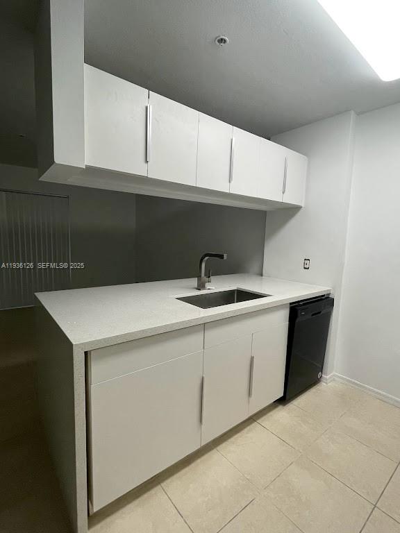 430 South Park Road, Unit 3305 Hollywood, FL 33021 - Photo 2 of 27 a kitchen with a sink and cabinets