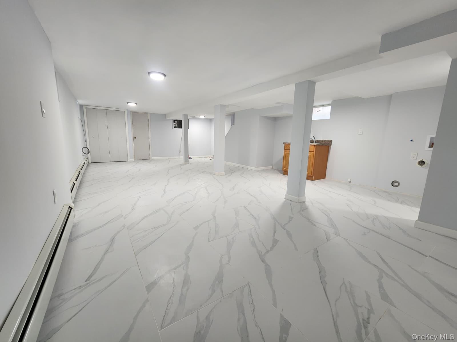 221-26 134th Road Queens, NY 11413 - Photo 11 of 30 a view of an empty room