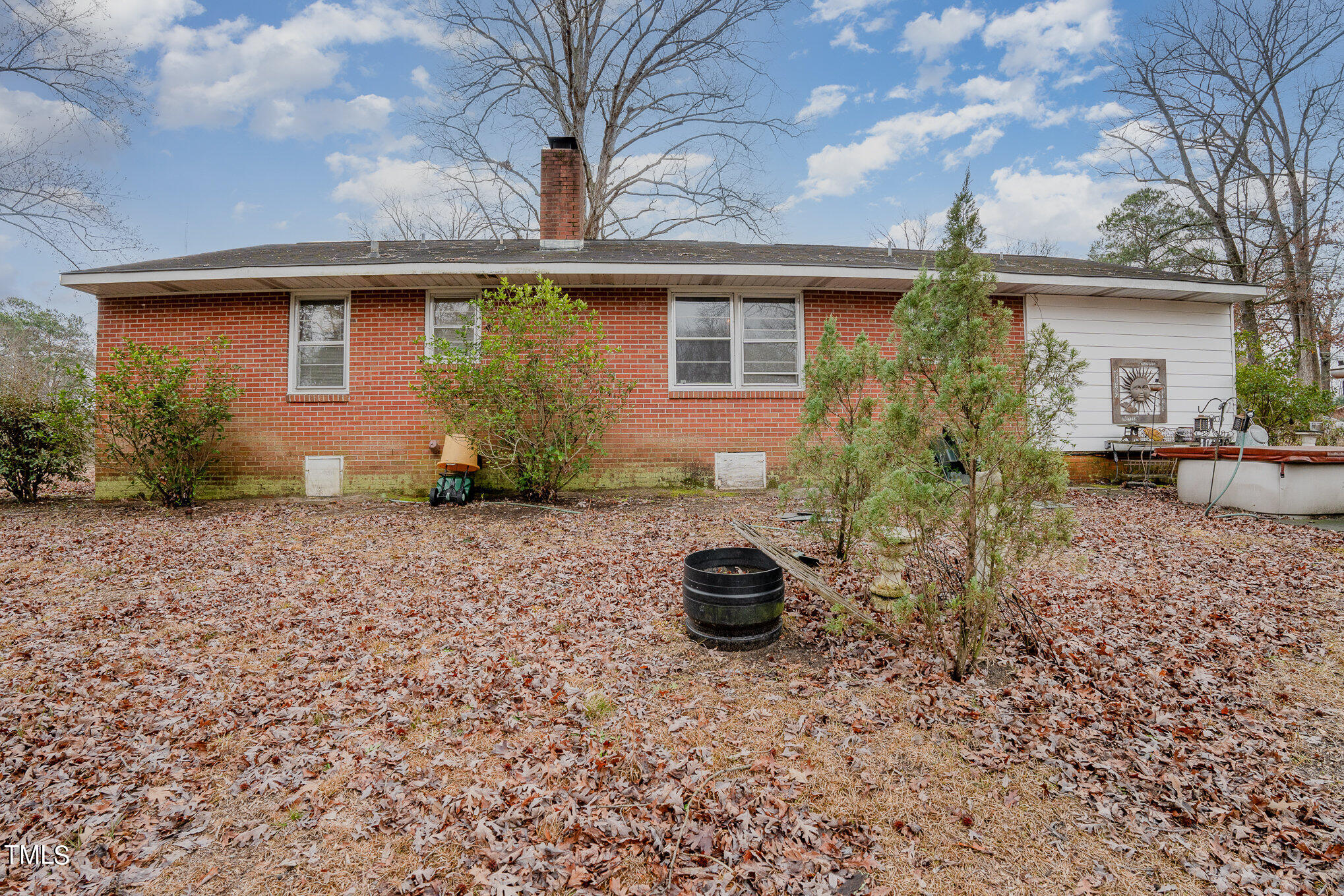 3628 Ridgecrest Avenue Fayetteville, NC 28303 - Photo 15 of 17 a front view of a house with plants
