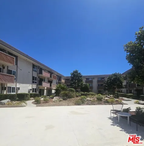 a view of a house with a swimming pool