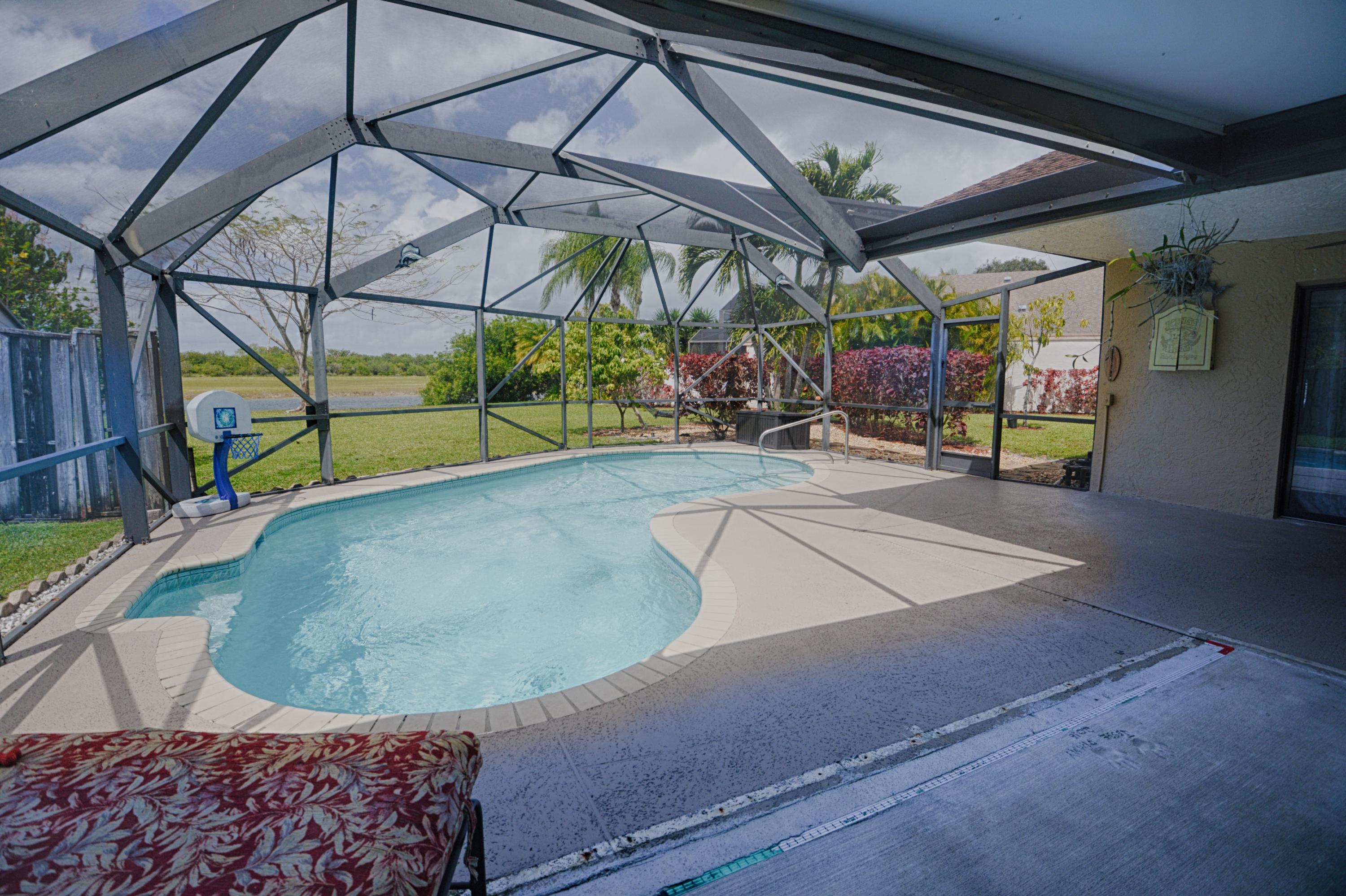 11885 Sunchase Court Boca Raton, FL 33498 - Photo 17 of 25 a view of a indoor swimming pool