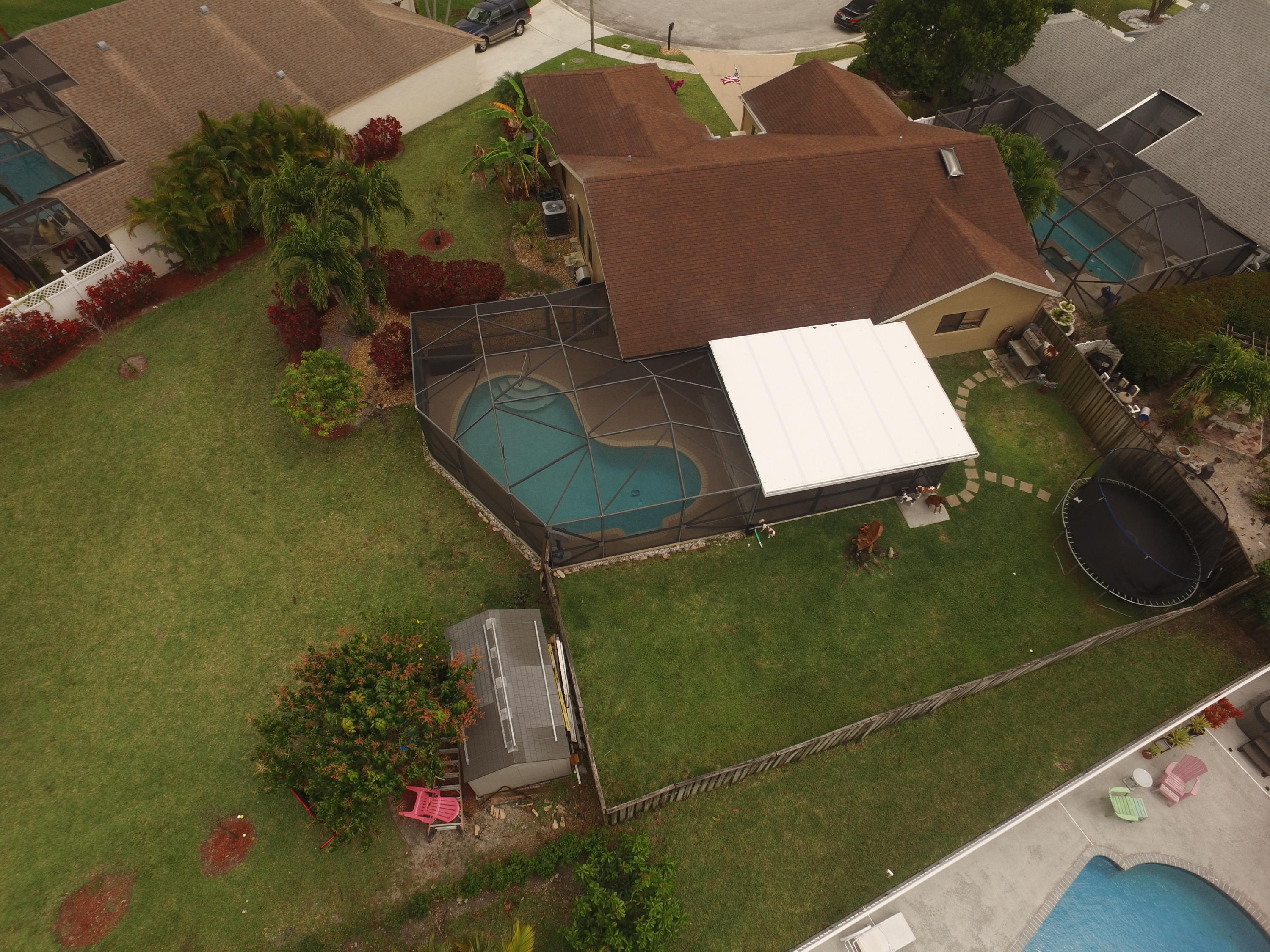 11885 Sunchase Court Boca Raton, FL 33498 - Photo 19 of 25 an aerial view of a house having yard