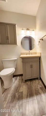 a bathroom with a sink and mirror