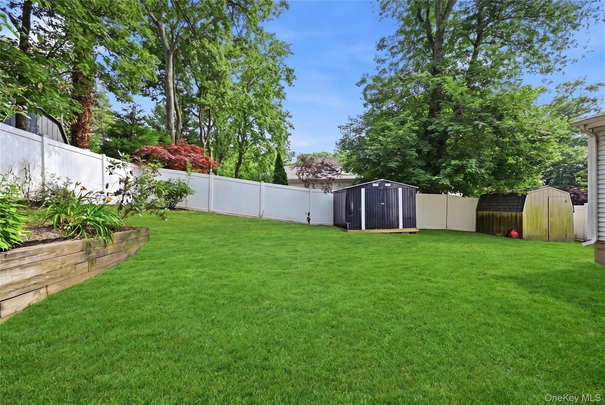 15 Birch Road Rocky Point, NY 11778 - Photo 29 of 30 backyard, grass was digitally enhanced
