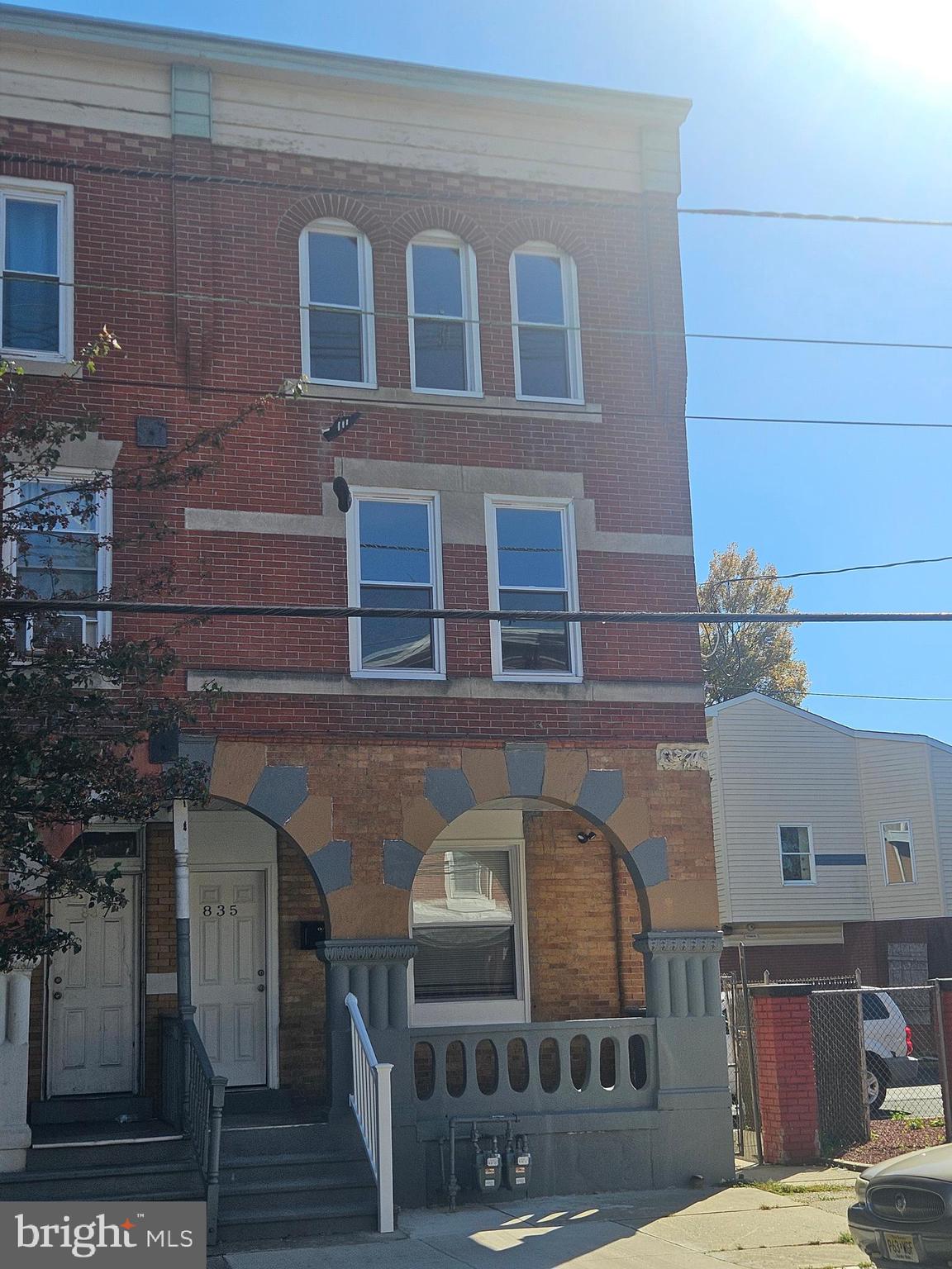 835 East State Street, Unit 1 Trenton, NJ 08609 - Photo 10 of 10 a front view of a building with glass windows and door