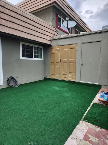 a view of a backyard with plants