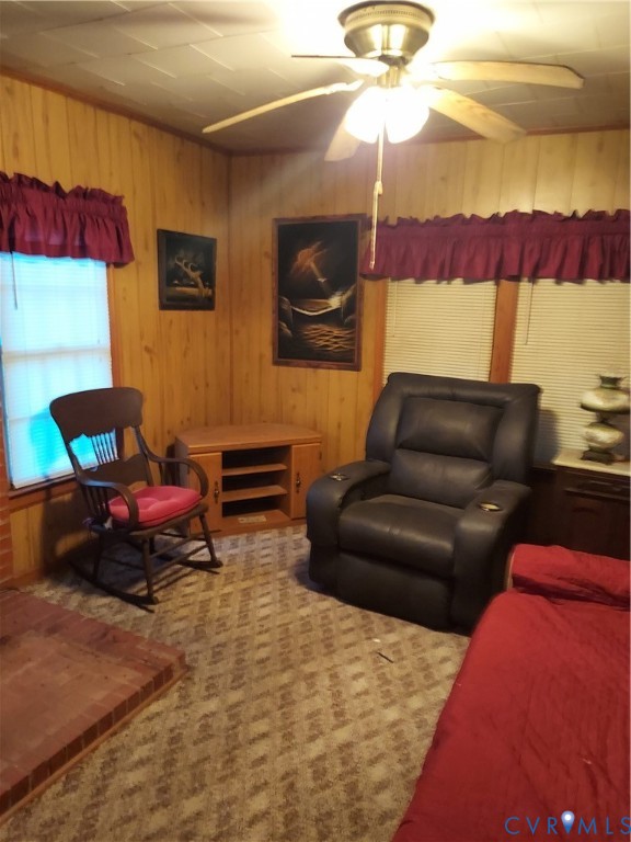 14511 Arwood Road Disputanta, VA 23842 - Photo 11 of 15 a bedroom with furniture and a lamp