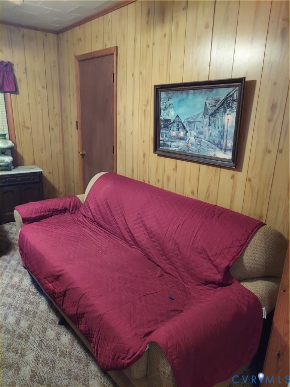 14511 Arwood Road Disputanta, VA 23842 - Photo 12 of 15 a bed sitting in a bedroom next to a window