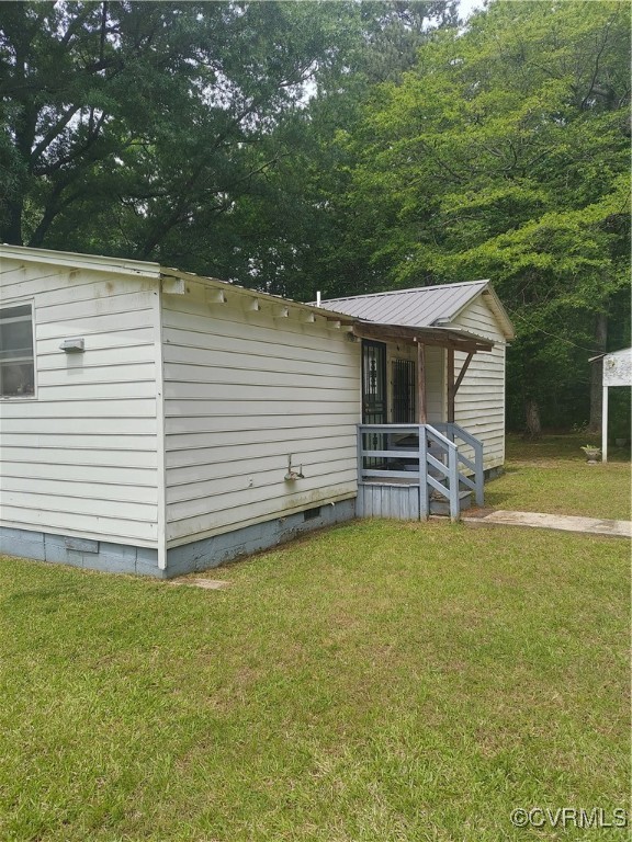 14511 Arwood Road Disputanta, VA 23842 - Photo 14 of 15 a view of a house with a backyard