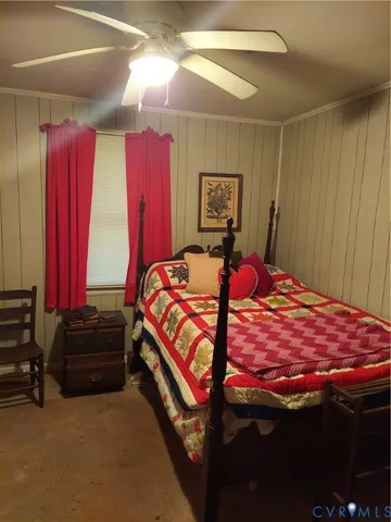 a bedroom with a bed and a closet