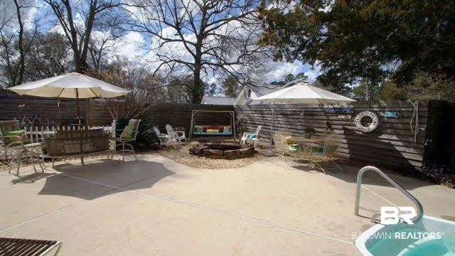 16220 Highway 104 Silverhill, AL 36576 - Photo 22 of 25 Countless Quaint Sitting Areas on Property around Pool.....this one has a Fire Pit