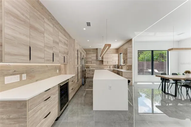 a view of walk in closet with clothes