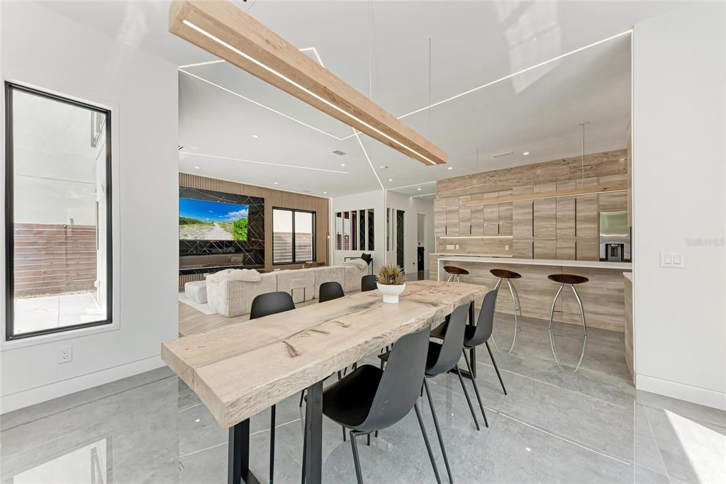 1716 9th Street Sarasota, FL 34236 - Photo 20 of 88 a view of a dining room with furniture and window