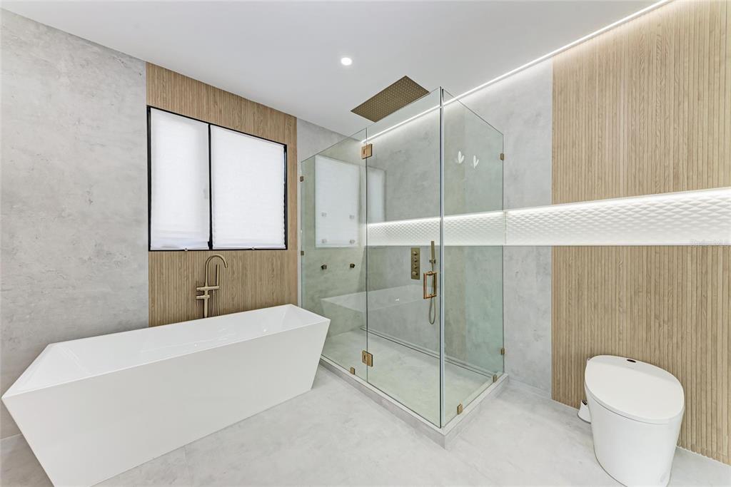 1716 9th Street Sarasota, FL 34236 - Photo 29 of 88 a bathroom with a toilet sink and shower