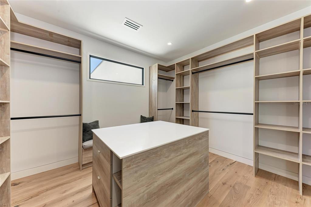 1716 9th Street Sarasota, FL 34236 - Photo 30 of 88 a white refrigerator freezer and a stove sitting inside of a kitchen