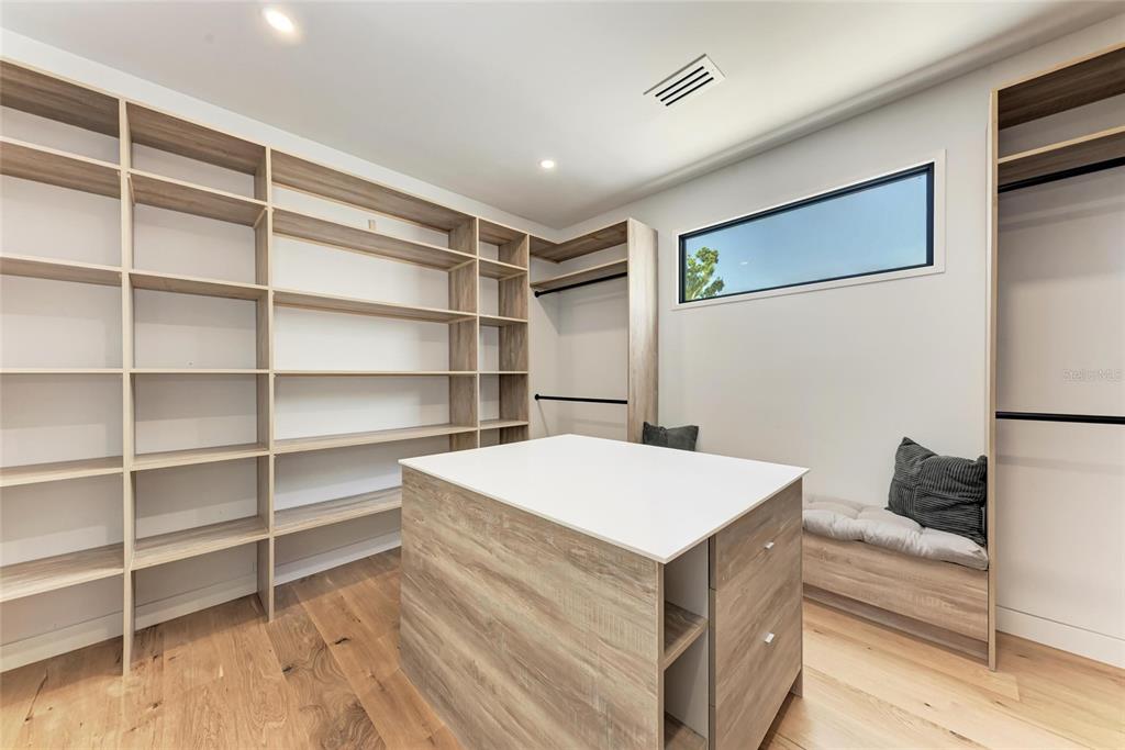 1716 9th Street Sarasota, FL 34236 - Photo 31 of 88 a room with a bed and a flat screen tv