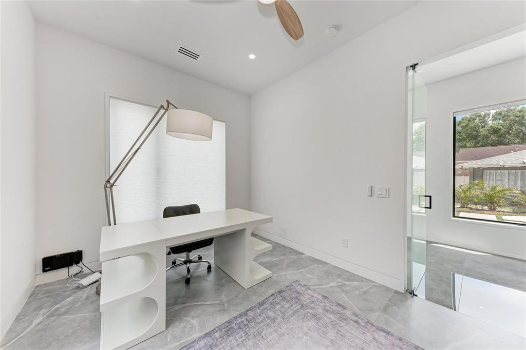 1716 9th Street Sarasota, FL 34236 - Photo 32 of 88 a view of hallway with furniture and a window