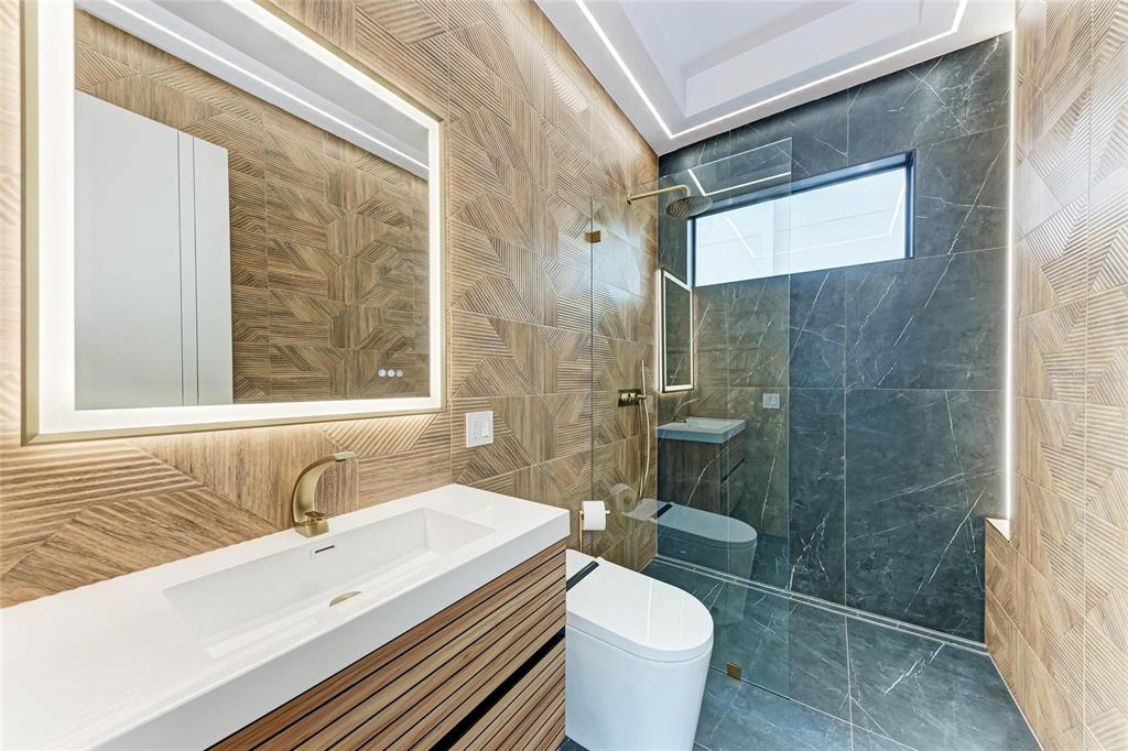 1716 9th Street Sarasota, FL 34236 - Photo 34 of 88 a bathroom with a sink toilet and shower