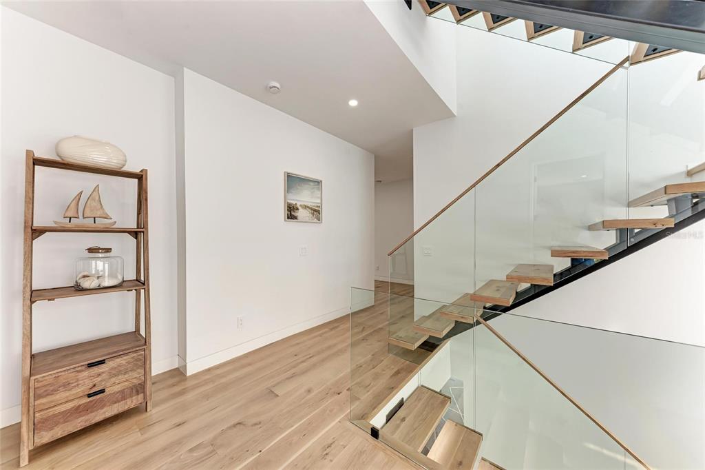 1716 9th Street Sarasota, FL 34236 - Photo 35 of 88 a view of hallway with stairs and wooden floor