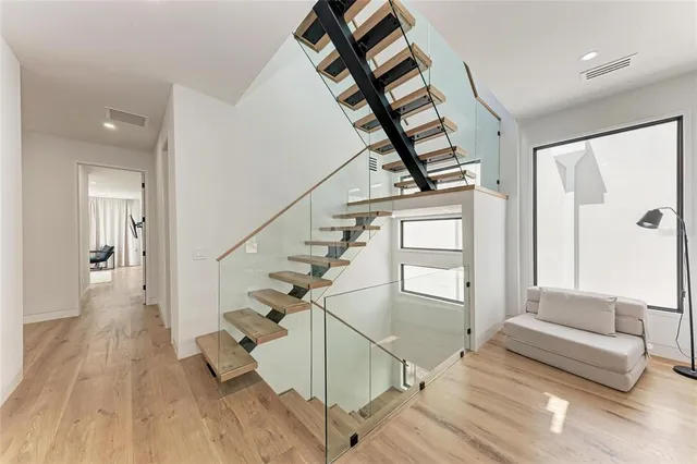 a bathroom with a sink a toilet and bathtub