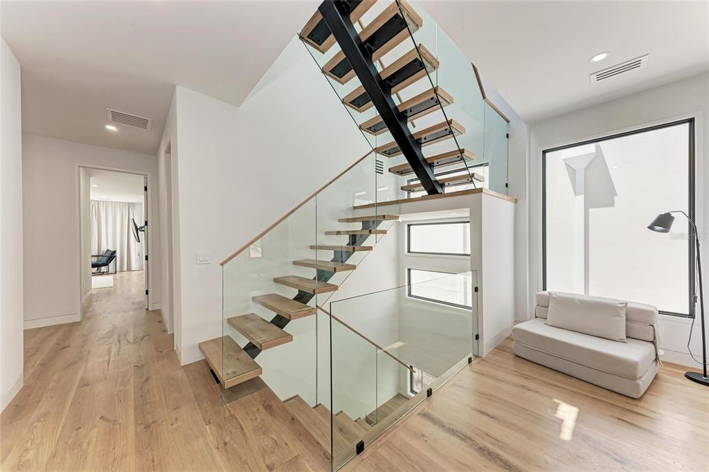 1716 9th Street Sarasota, FL 34236 - Photo 36 of 88 a view of entryway and hall with wooden floor