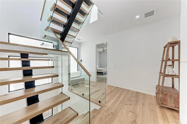 a bathroom with a sink a mirror and a toilet