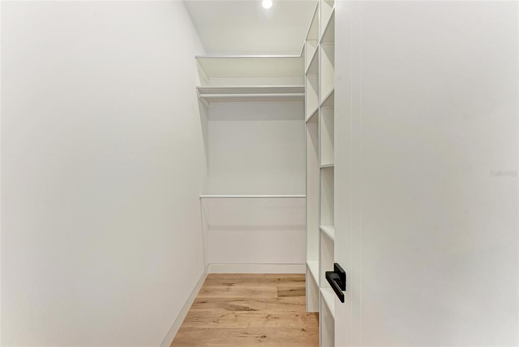 1716 9th Street Sarasota, FL 34236 - Photo 44 of 88 a view of an empty walk in closet