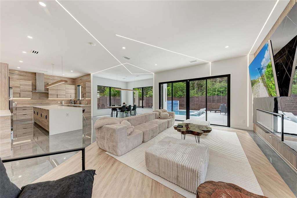 1716 9th Street Sarasota, FL 34236 - Photo 10 of 88 a living room with furniture and a flat screen tv
