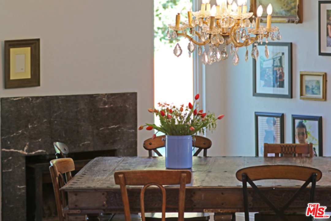 1580 Las Virgenes Road Calabasas, CA 91302 - Photo 14 of 51 a view of a dining room with furniture and chandelier
