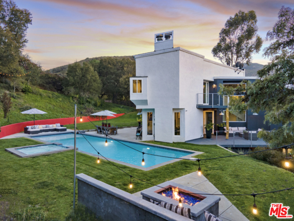 1580 Las Virgenes Road Calabasas, CA 91302 - Photo 3 of 51 a view of a house with pool