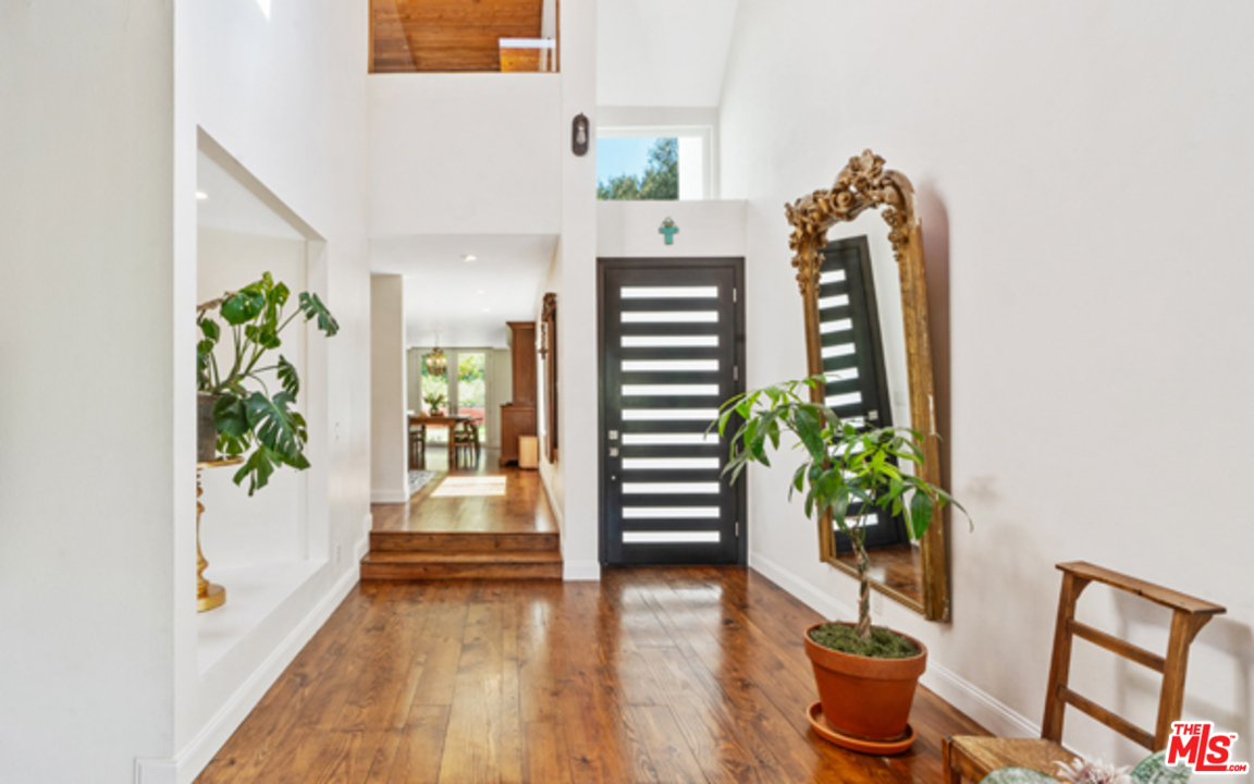 1580 Las Virgenes Road Calabasas, CA 91302 - Photo 4 of 51 a view of entryway with wooden floor