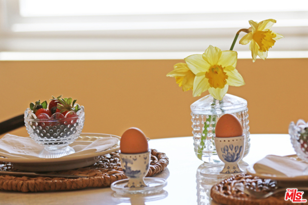 1580 Las Virgenes Road Calabasas, CA 91302 - Photo 33 of 51 a room with a mirror and chandelier