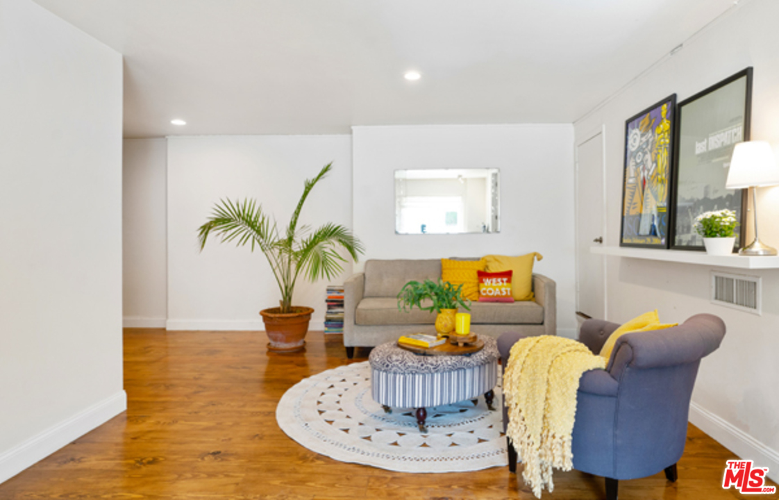 1580 Las Virgenes Road Calabasas, CA 91302 - Photo 34 of 51 a living room with furniture flowerpot and a window