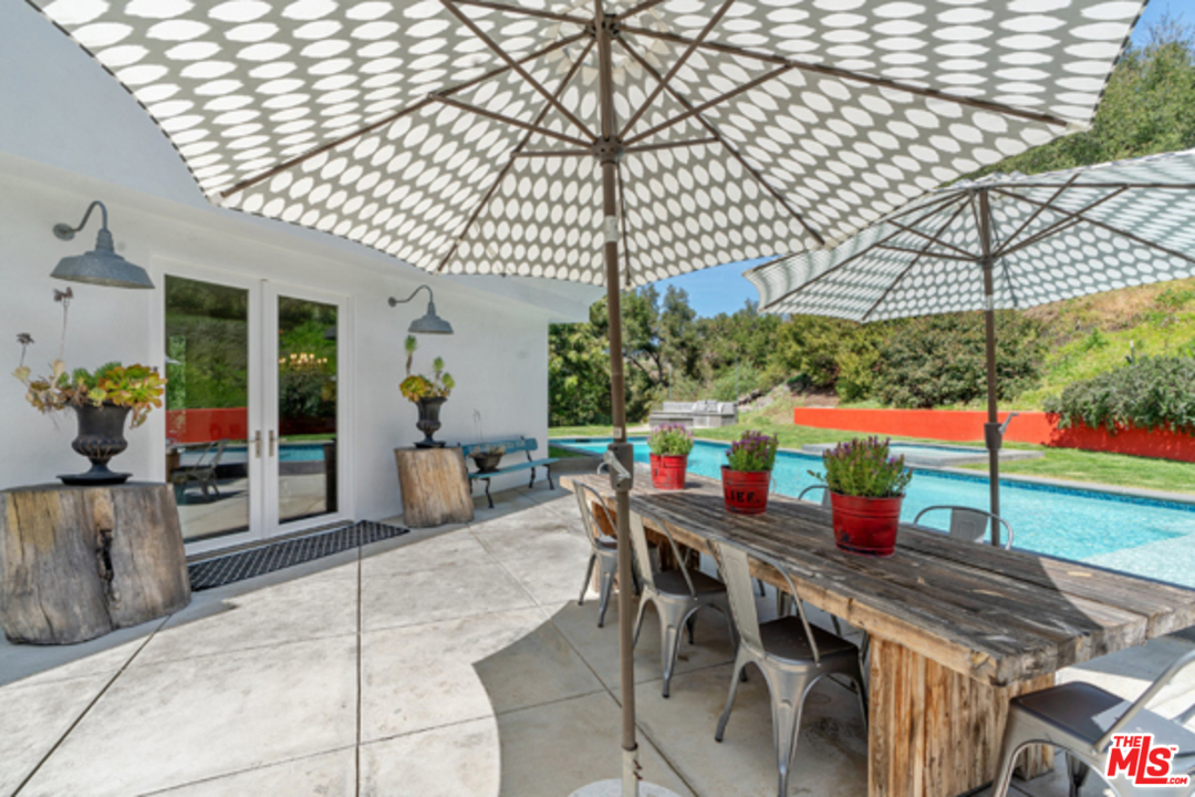 1580 Las Virgenes Road Calabasas, CA 91302 - Photo 38 of 51 a view of outdoor dining space kitchen and patio