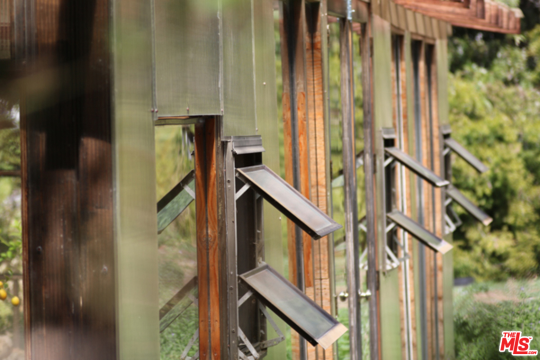 1580 Las Virgenes Road Calabasas, CA 91302 - Photo 41 of 51 a view of an entryway with a small yard