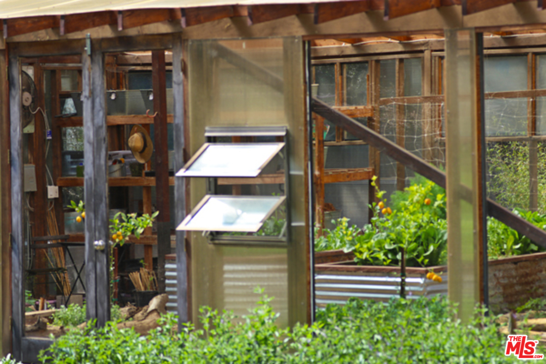 1580 Las Virgenes Road Calabasas, CA 91302 - Photo 42 of 51 a view of a house with a street